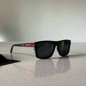 Prada Black Sunglasses with Red Accent